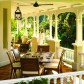 Anassa Dining Group on Covered Porch